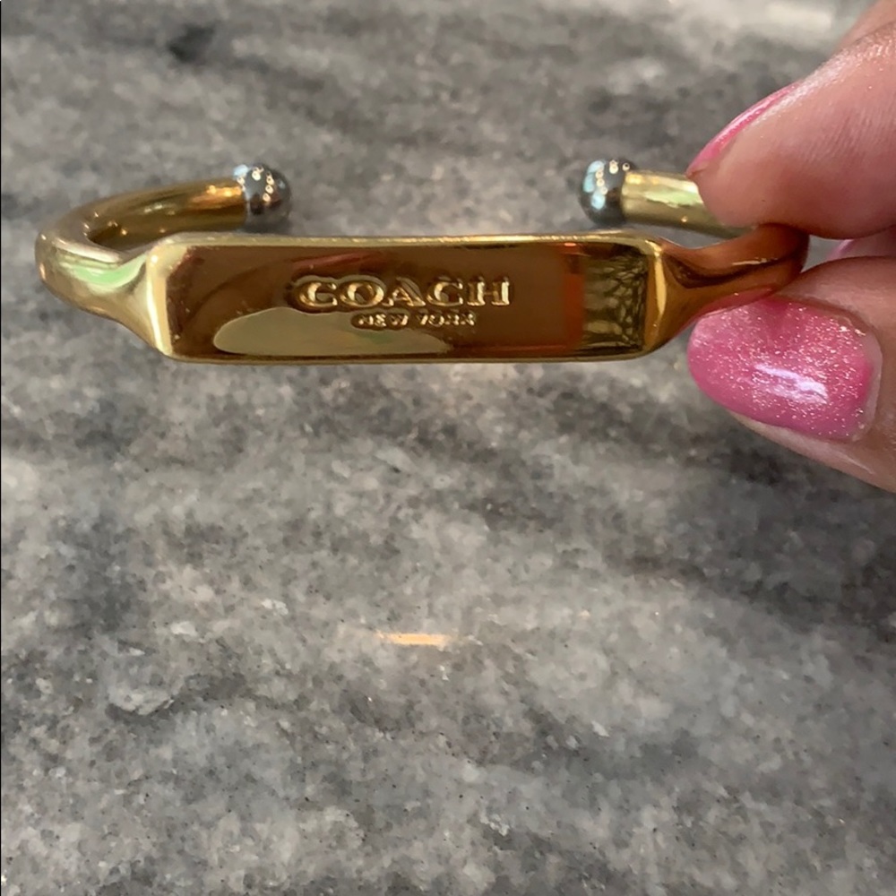 COACH open cuff bracelet.